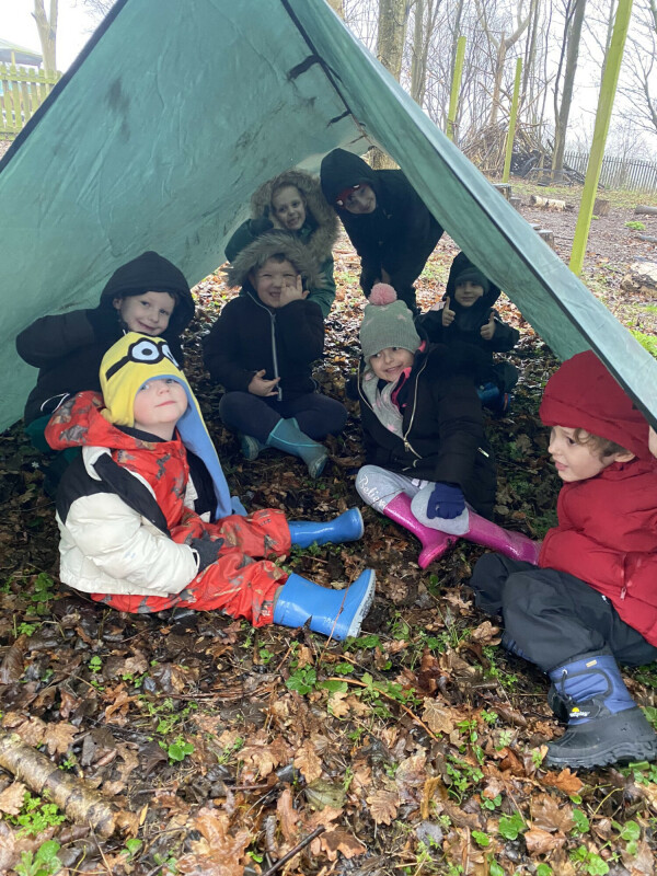 Frodsham children enjoy life under canvas during a forest school session in the school grounds