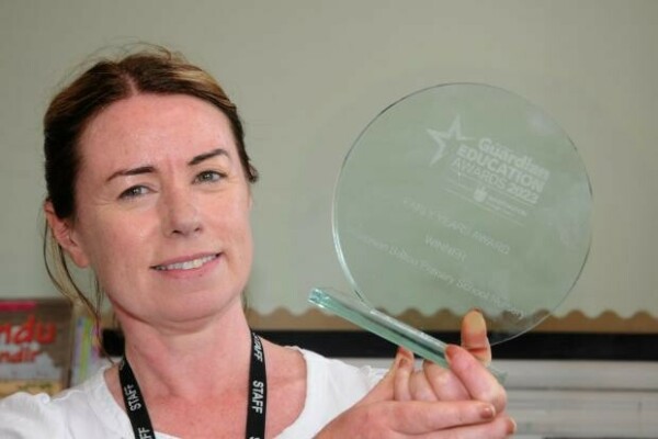 Christina Richards, Early Years Lead at Alderman Bolton, holding the award