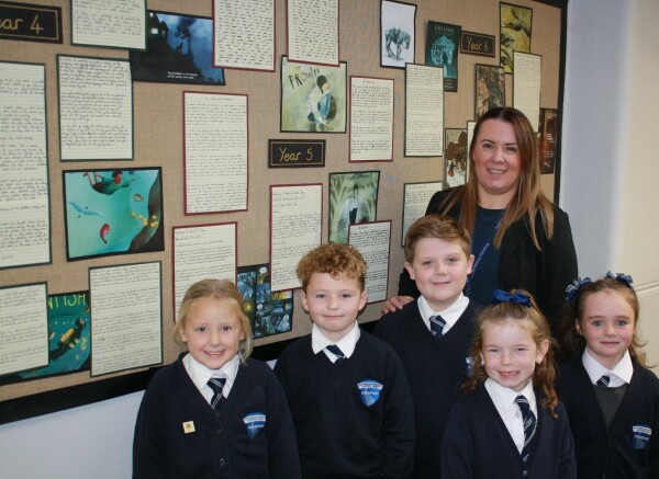 Kingsway Head with smiling children, celebrating GOOD Ofsted result