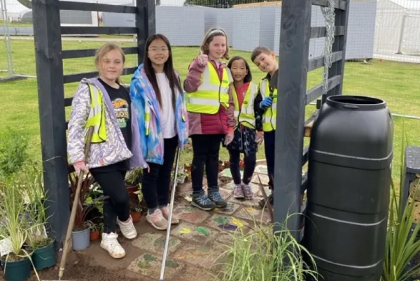 The Bruche pupils building their garden