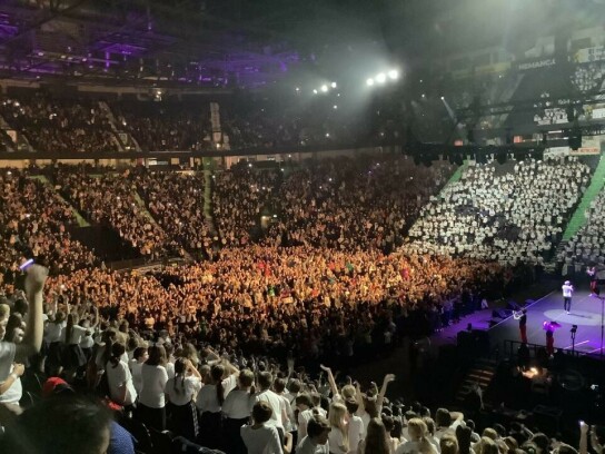 The mass choir performing with Heather Small in Manchester AO Arena